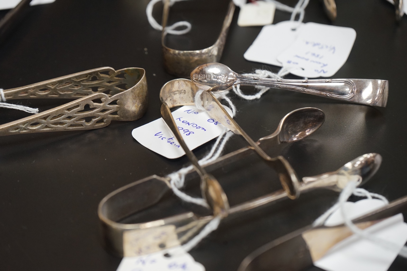 Ten assorted pairs of mainly 19th century silver sugar tongs, earliest pair by Jonathan Hayne, London, 1821.